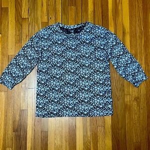 Gap Kids Girl Top. Blue with a white flower pattern. Size XL